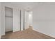 A well-lit bedroom with convenient closet access to sliding and standard doors at 18795 E Elizar Dr, Gold Canyon, AZ 85118