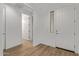 Clean and bright entryway featuring wood floors and neutral decor at 18795 E Elizar Dr, Gold Canyon, AZ 85118