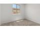 Bedroom featuring neutral carpet, a bright window, and neutral wall color at 18507 E Camila Dr, Gold Canyon, AZ 85118