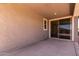 This covered patio features a stained concrete floor and views of the backyard at 18507 E Camila Dr, Gold Canyon, AZ 85118