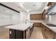 Spacious kitchen with large island, stainless steel appliances, and modern design at 17448 W Carlisle Dr, Surprise, AZ 85388