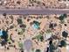 Stunning aerial view of a luxurious property with a pool and lush landscaping, offering privacy and tranquility near Jomax Road at 26595 N 86Th St, Scottsdale, AZ 85255