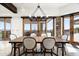 Dining room with a wooden table and seating for six with views of the valley at 11070 E Rolling Rock Dr, Scottsdale, AZ 85262