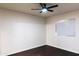 Bright bedroom with a ceiling fan and a window at 4030 N Palm Cir, Eloy, AZ 85131