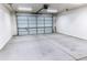 A spacious two-car garage with overhead lighting at 4030 N Palm Cir, Eloy, AZ 85131