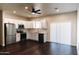 Bright kitchen features stainless steel appliances, white cabinetry, and modern fixtures at 4030 N Palm Cir, Eloy, AZ 85131