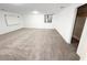 Finished basement with neutral carpet and a storage closet at 15303 E Rio Verde Dr, Scottsdale, AZ 85262