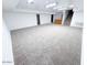 Finished basement offers lots of open space and neutral carpet at 15303 E Rio Verde Dr, Scottsdale, AZ 85262