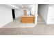 Finished basement features tile and carpet flooring, wooden bar, and staircase at 15303 E Rio Verde Dr, Scottsdale, AZ 85262
