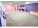 Finished basement with carpeting and custom wall colors at 15303 E Rio Verde Dr, Scottsdale, AZ 85262