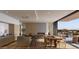 Open living space with a fireplace and a sliding door to a stunning exterior view at 4849 N Camelback Ridge Rd # A409, Scottsdale, AZ 85251