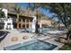 Gorgeous pool area with cabanas, a hot tub, palm trees, and mountain views at 4849 N Camelback Ridge Rd # A409, Scottsdale, AZ 85251