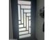 Modern door with square glass insets offering plenty of privacy and style at 5007 W Weldon Ave, Phoenix, AZ 85031