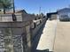 Charming single-story home featuring a block fence with rock and glass details at 5007 W Weldon Ave, Phoenix, AZ 85031