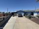 Charming blue single-story home featuring a long driveway and potential backyard oasis at 5007 W Weldon Ave, Phoenix, AZ 85031