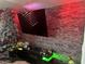 This decorated living room has a modern tv and a Christmas tree near the wall at 5007 W Weldon Ave, Phoenix, AZ 85031