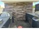 This outdoor kitchen offers lots of counter space, storage and a built in BBQ area at 5007 W Weldon Ave, Phoenix, AZ 85031