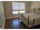 This is a view of the bedroom, and includes a bed and window at 19595 N Sunburst Way, Surprise, AZ 85374