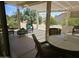 Covered patio with stylish wicker furniture offers an inviting space for outdoor living at 19595 N Sunburst Way, Surprise, AZ 85374