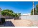 A spacious backyard area with a garden bed, perfect for outdoor activities and landscaping at 1660 N 59Th St, Mesa, AZ 85205