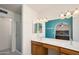 Bathroom featuring double sinks, wood cabinets, walk-in shower, and plenty of counter space at 1660 N 59Th St, Mesa, AZ 85205