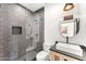 Modern bathroom features a glass enclosed shower with gray tile and black accents and a vessel sink at 24724 N 119Th Pl, Scottsdale, AZ 85255