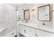Bright bathroom with a glass-enclosed shower, double vanity and gold accents at 24724 N 119Th Pl, Scottsdale, AZ 85255