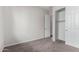 Spacious bedroom with closet and door to hallway at 16400 W Avenida Del Sol --, Surprise, AZ 85387