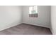 Well-lit bedroom with carpet and a window at 16400 W Avenida Del Sol --, Surprise, AZ 85387