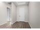 Bright entryway with hardwood floors and neutral walls at 16400 W Avenida Del Sol --, Surprise, AZ 85387