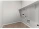 Laundry room with shelving and space for a washer and dryer at 16400 W Avenida Del Sol --, Surprise, AZ 85387