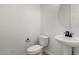 Clean bathroom with pedestal sink and toilet at 16412 W Avenida Del Sol --, Surprise, AZ 85387
