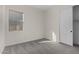 Spacious bedroom featuring gray carpet and a closet at 16412 W Avenida Del Sol --, Surprise, AZ 85387