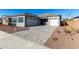 House exterior with two-car garage and landscaping at 16412 W Avenida Del Sol --, Surprise, AZ 85387