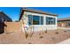 House exterior with landscaping and stone accents at 16412 W Avenida Del Sol --, Surprise, AZ 85387