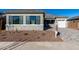 New construction home with a two-car garage and landscaped front yard at 16412 W Avenida Del Sol --, Surprise, AZ 85387