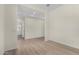 Bright hallway with wood-look flooring at 16412 W Avenida Del Sol --, Surprise, AZ 85387
