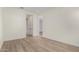 Hallway with light wood flooring and access to rooms at 16412 W Avenida Del Sol --, Surprise, AZ 85387