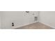 Bright laundry room with tile floor and built-in shelving at 16412 W Avenida Del Sol --, Surprise, AZ 85387