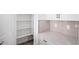 Bright white pantry with ample shelving at 16412 W Avenida Del Sol --, Surprise, AZ 85387