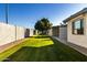 Landscaped community walkway with mature trees and a neat, clean appearance at 7950 E Keats Ave # 133, Mesa, AZ 85209