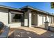 House exterior featuring a light brick facade, and a two-car garage at 7950 E Keats Ave # 133, Mesa, AZ 85209