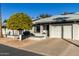 Attractive front yard with a mature orange tree, adding curb appeal to the property at 7950 E Keats Ave # 133, Mesa, AZ 85209