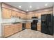 Bright kitchen features stainless steel appliances and light wood cabinets at 7950 E Keats Ave # 133, Mesa, AZ 85209