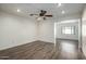 Living room with wood-look flooring and a ceiling fan at 7950 E Keats Ave # 133, Mesa, AZ 85209