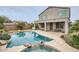 Resort style backyard featuring a pool, spa, and patio seating at 4803 E Barwick Dr, Cave Creek, AZ 85331