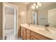 Bathroom with large mirror, double sinks, and shower at 4803 E Barwick Dr, Cave Creek, AZ 85331