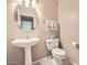 Bathroom featuring pedestal sink and toilet at 4803 E Barwick Dr, Cave Creek, AZ 85331