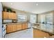 Open kitchen with granite countertops and light wood cabinetry at 4803 E Barwick Dr, Cave Creek, AZ 85331