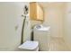Functional laundry room with cabinets, a washer, and a dryer at 4803 E Barwick Dr, Cave Creek, AZ 85331